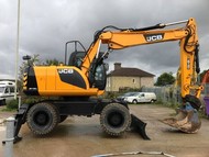 Колесный экскаватор JCB JS 130W