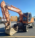 Колёсный экскаватор Doosan DX140W Ace 2015 года